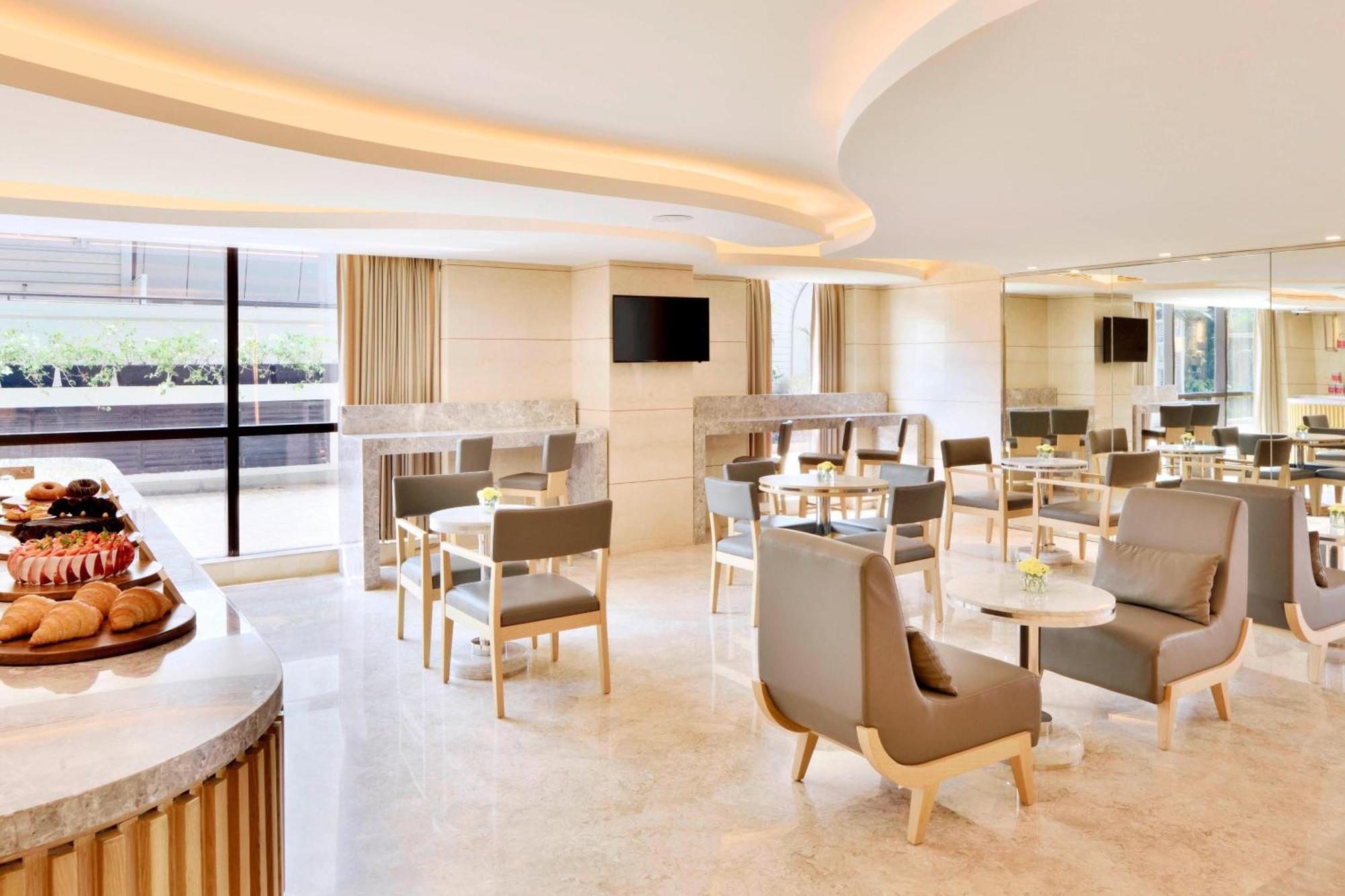 คอร์ตยาร์ด บาย แมริออท เบงกาลูรู เฮบบัล Hotel บังกาลอร์ ภายนอก รูปภาพ
